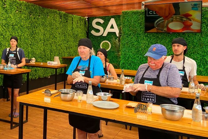 #1 Rated Cooking Classes with Local Market Tour & Pickup - Fruit tasting, pisco, and the social side of class
