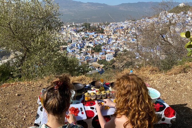 3-Hour Cooking Class overlooking the Blue City - What makes the hosts part of the experience