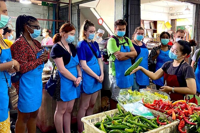 6-Hour Akha Tribe Culture and Cooking Class in Chiang Mai - The local market: same produce, different prices