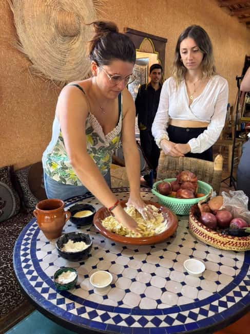 Agadir: Moroccan Cooking Class with Market Visit - Preparing a Moroccan tagine