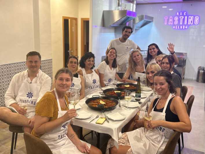 Alicante Paella Cooking Class, Tapas, Drinks and Market - Learning Alicante-style rice from a local chef