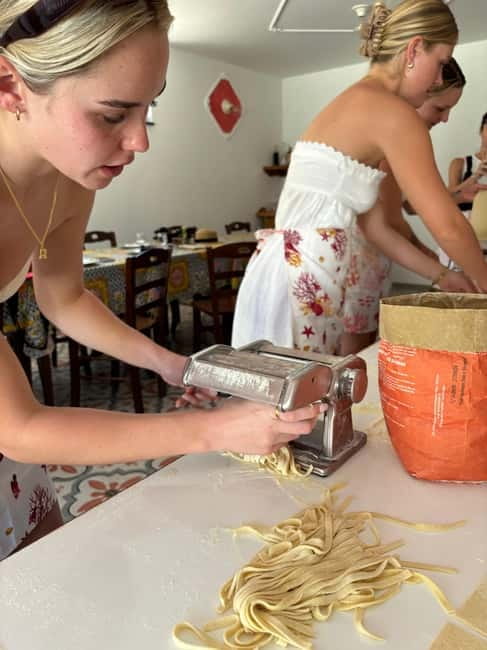 Amalfi Coast: Mozzarella, Pasta and Tiramisù Cooking Class - Rolling fresh tagliatelle with oil and eggs