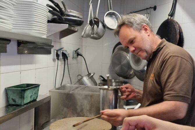 Amazing Sweet Crêpe Cooking Class Paris - Mixing the batter without lumps