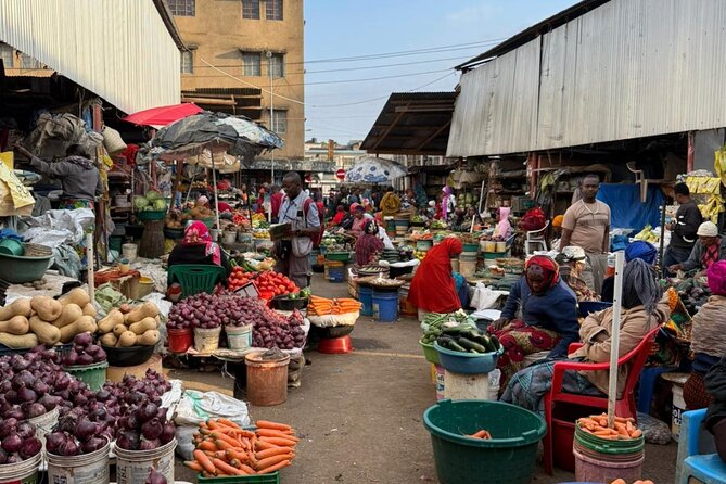 Arusha: Traditional Tanzania Cooking class& Food Market Tour - Arusha Central Market: food, people, and daily work
