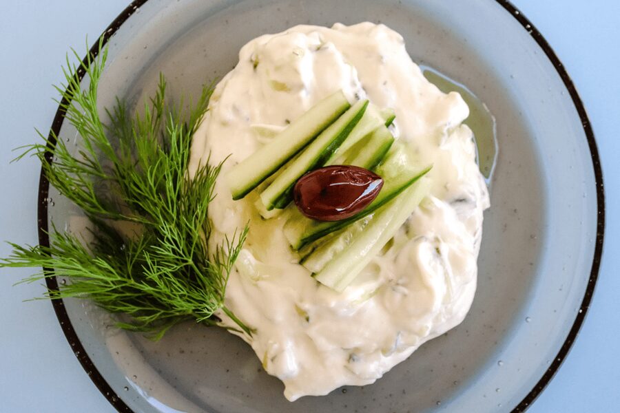 Athens: Greek Cooking Class with Meal and Drinks - Cooking moussaka with cashew béchamel
