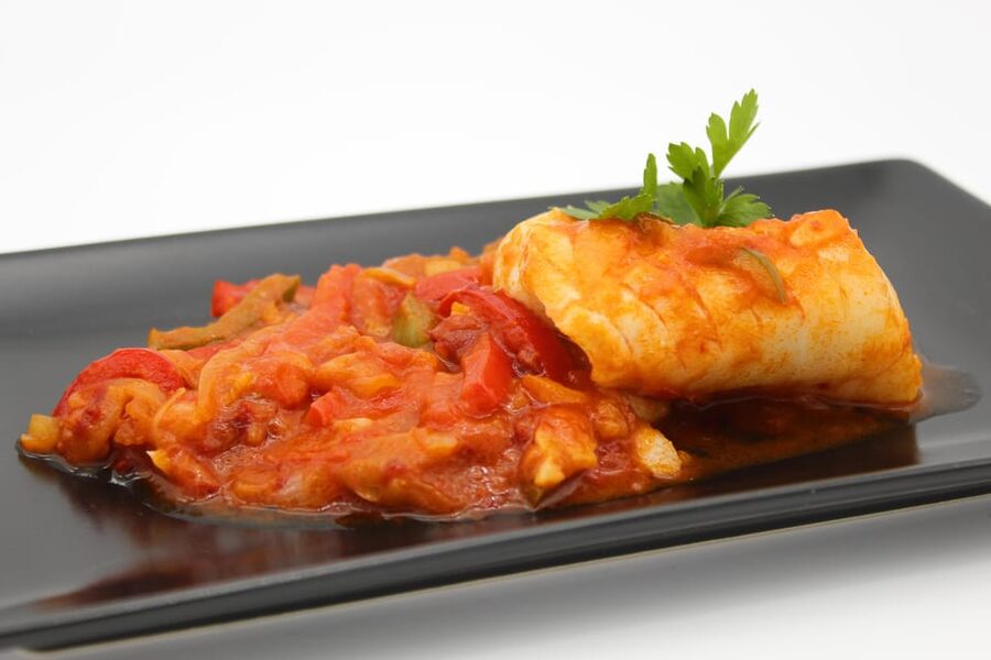 Authentic Tapas Cooking Class at a Private Eatery in Madrid - Making black-ink squid paella