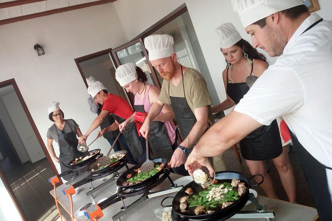 Authentic Valencian Paella Cooking Class - Tapas and wine while the rice cooks