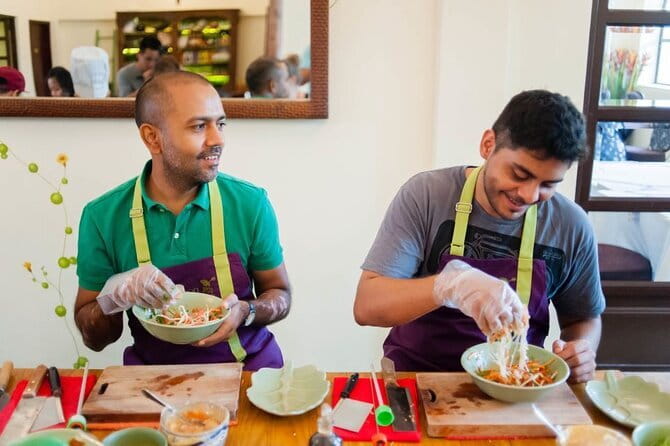 Authentic Vietnamese Cooking Class with Market Visit in HCMc - Cooking with the chef and instructor