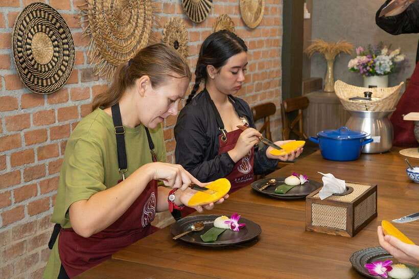 Bangkok: Cooking Class with Market Visit & Tuk Tuk Ride - Cooking Four Thai Dishes in an Air-Conditioned Kitchen