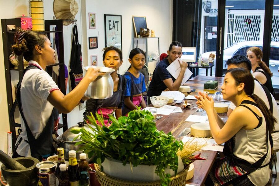 Bangkok: Thai Cooking Class and Onnuch Market Tour - From market shopping to the cooking bench