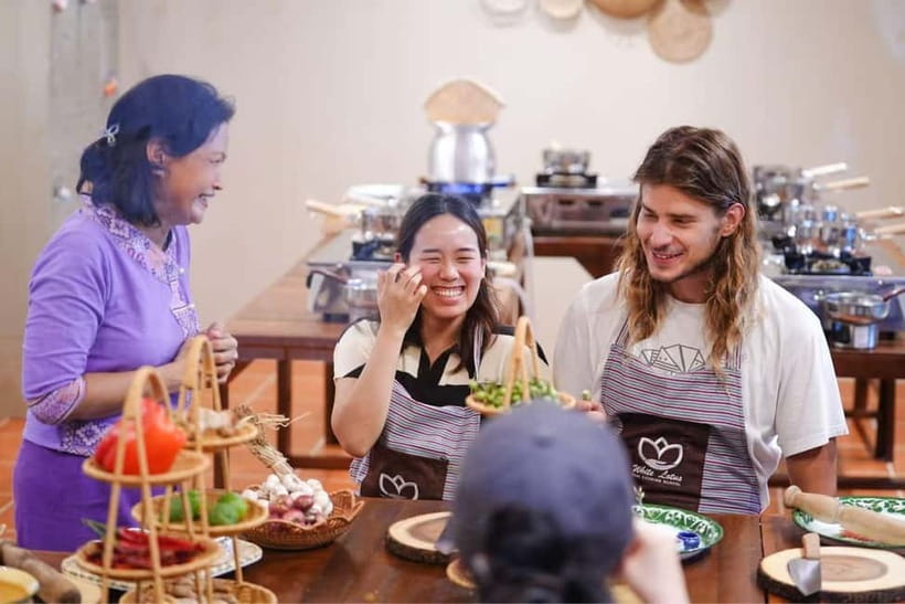 Bangkok: White Lotus Thai Cooking Class with Market Tour - Making coconut milk from scratch