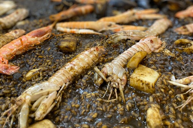 Barcelona: Black Ink Seafood Paella Cooking Class - What the $87.11 price includes in value