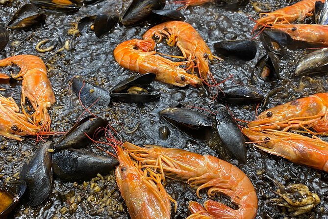 Barcelona: Black Ink Seafood Paella Cooking Class - Starting with cava, jamón, and pan con tomate