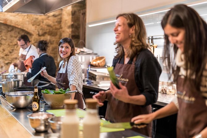 Barcelona Culinary Experience: Paella & Tapas Cooking Class - Paella takes center stage
