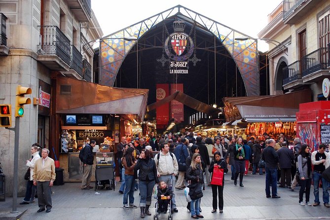 Barcelona : Paella Cooking Experience + Boqueria Market Exclusive Tour - Taking your turn at paella