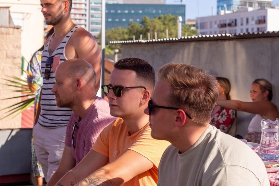 Barcelona: Rooftop Paella Cooking Class with Sangria - A small blue door and a rooftop kitchen