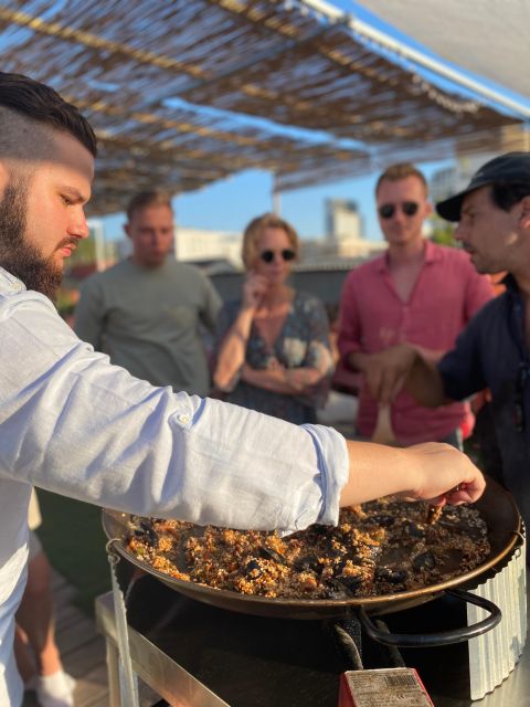 Barcelona: Rooftop Paella Cooking Class with Sangria - The rooftop meal is the payoff
