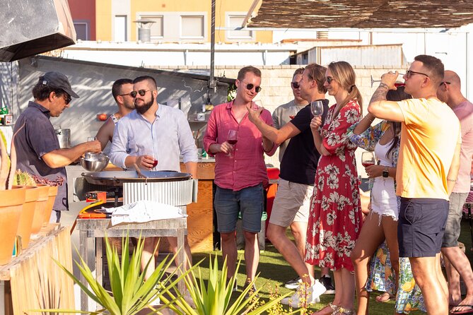 Barcelona Rooftop Paella Cooking Class with Sangria & Local Host - Learning why paella works