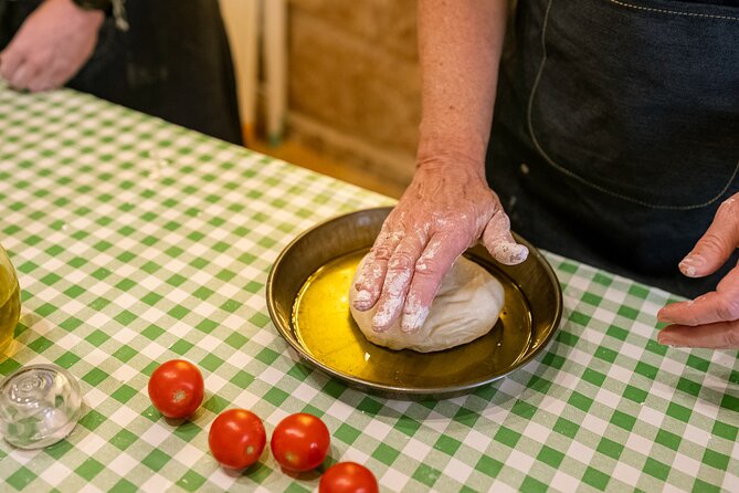 Bari Cooking Class: Traditional Focaccia & Orecchiette - Eating what you made, with wine on the table