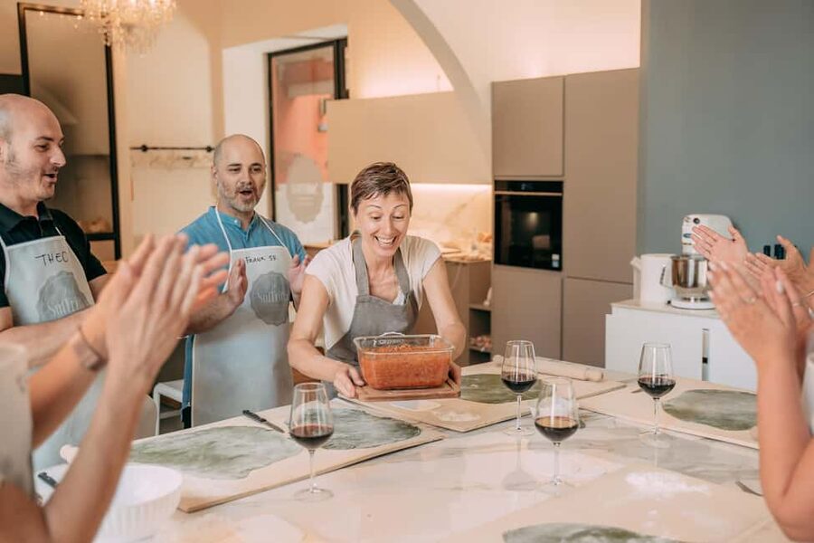 Bologna: Original Lasagna & Gelato Class at a Cooking School - Sitting down to eat what you made