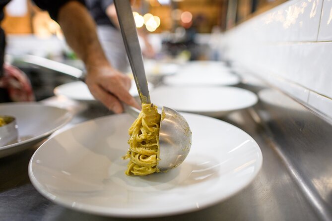 Bologna: Pasta and Tiramisu Small Group Cooking Class with Wine - The shared meal and wine service