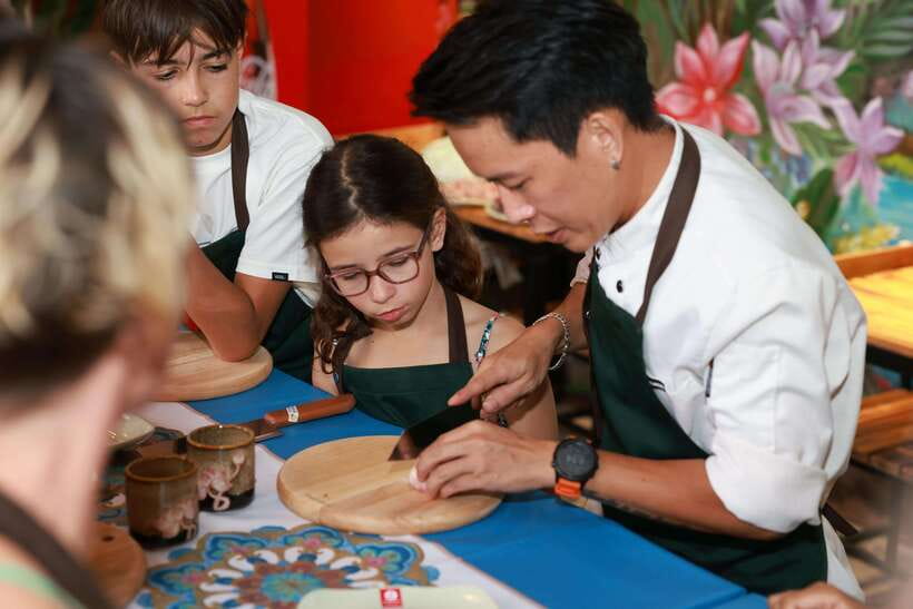 CatBa: Authentic Vietnam Cooking Class and local market tour - Eating what you prepared as the sun sets