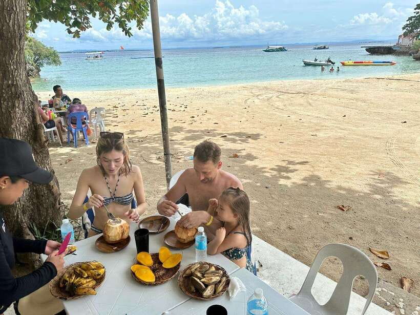 Cebu Traditional Bamboo Cooking Class - Waiting for charcoal cooking with a beach break