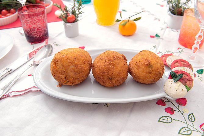 Cesarine: Home Cooking Class & Meal with a Local in Catania - The hosts are a major part of the value