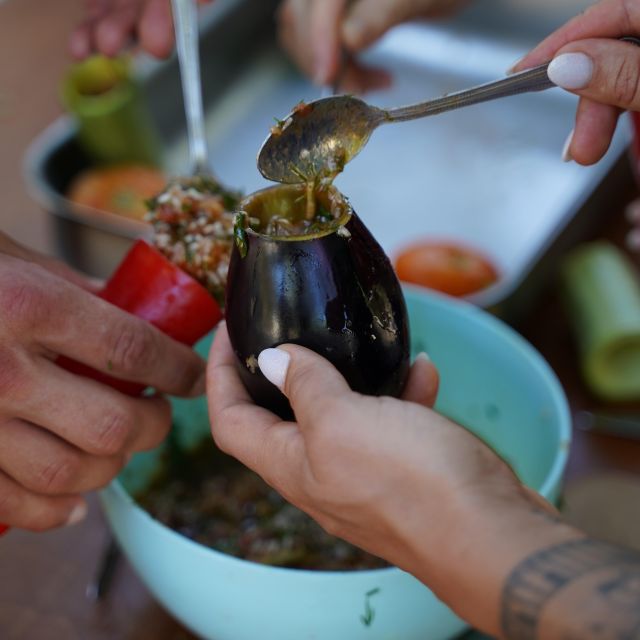Chania: Authentic Cooking Class - A long table, local wine, and raki