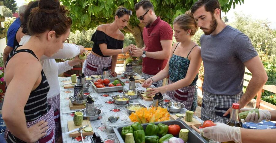 Chania: Authentic Cooking Class in the White Mountains - Walking through the garden before cooking