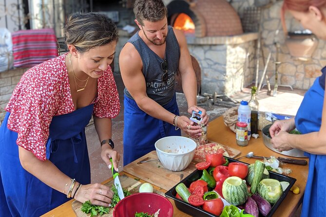 Chania Cooking Class-The Authentic Enjoy traditional Cretan meal - Rolling dough for savory and sweet kalitsounia
