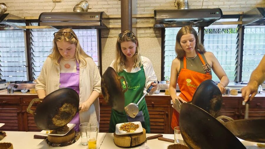 Chiang Mai: Morning Cooking Class with Market Visit - Picking herbs in an organic garden
