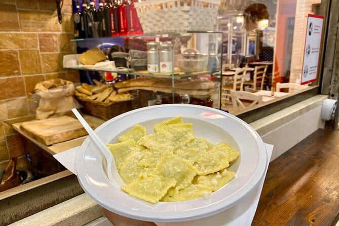 Cooking Class and Lunch at a Tuscan Farmhouse with Local Market Tour from Florence - The four-course lunch and Tuscan wine