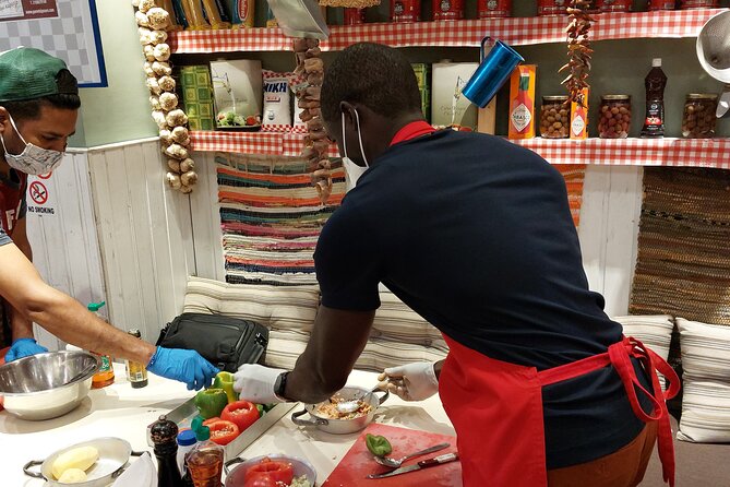 Cooking Class in Athens with Shopping in Central Market & Lunch - Lunch, wine, and the value of the $101.55 price