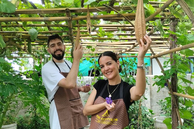 Cooking class in organic garden and local market tour ThaiCottage - Starting at a real Chiang Mai market