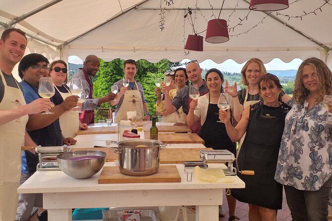 Cooking Class on a Family Farm in Chianti with Lunch - Eating outside above the vineyards
