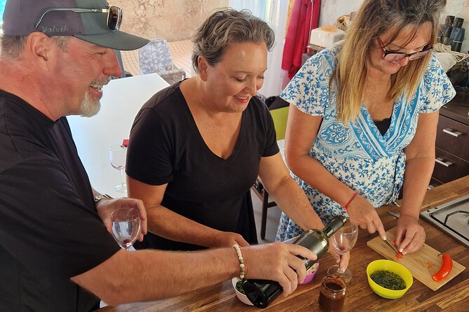 Cooking class on island Brac - Picking tomatoes, peppers, and eggplant