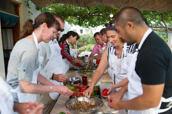 Cretan Cooking Class at a Farm with Hotel Pickup and Drop-Off - A family dinner with homemade wine
