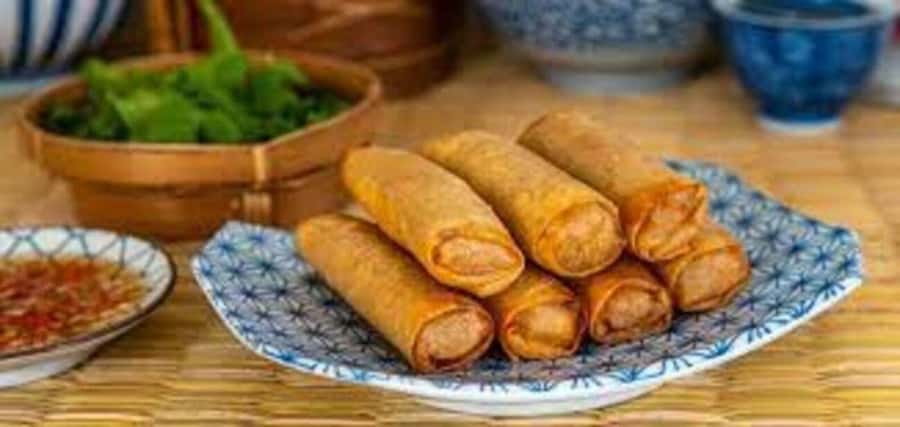 Da Nang: Cooking Pho & Vietnamese Dishes With Local Chef - Making Vietnamese spring rolls by hand