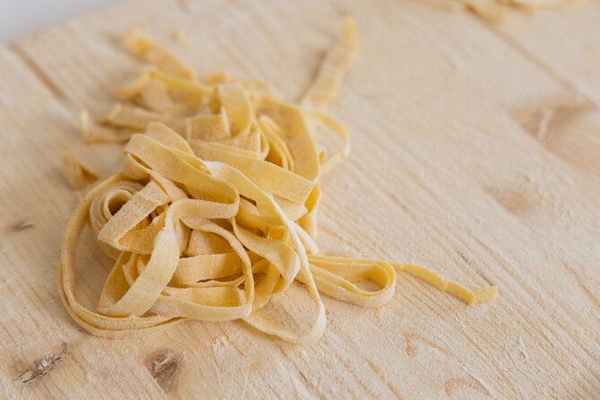 Enjoy Spritz and Pasta Making in Piazza Navona - Sitting down to eat your Roman meal