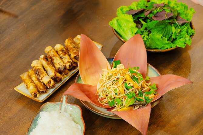 Experience Hanoi Cooking Class with Free Wine Tasting - Four Dishes, Traditional Skills, and Useful Kitchen Tips