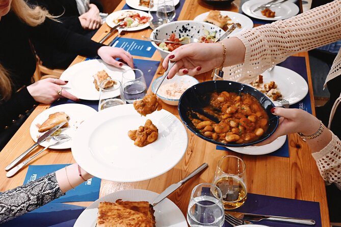 "Fetaverse" Private Cooking Class in Koukaki Athens - Folding mini spinach pies by hand