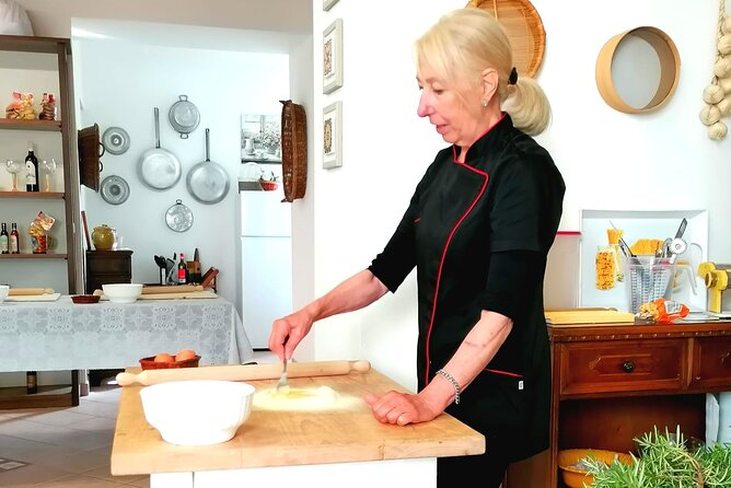 Fettuccine & Ravioli Class in Assisi’s Home-Style Cooking School - Kneading, rolling, and shaping fresh fettuccine