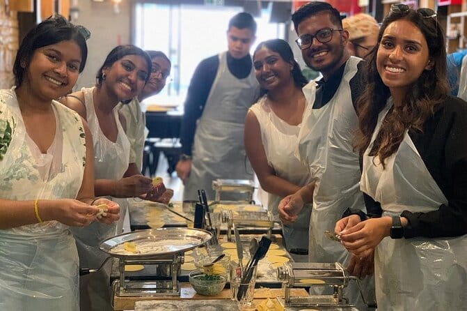 Florence: Cooking Class Pasta & Tiramisu Making Unlimited Wine - Rolling pasta and shaping ravioli