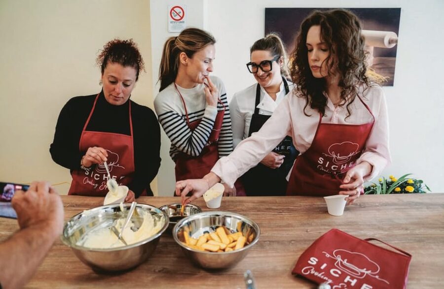 Florence: Fresh Pasta and Tiramisu Cooking Class - Sitting down to eat what you made