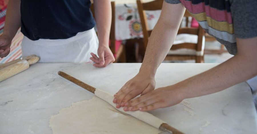 From Mykonos: Mykonian Farm Baking Class with Brunch - Kneading the dough with Mike