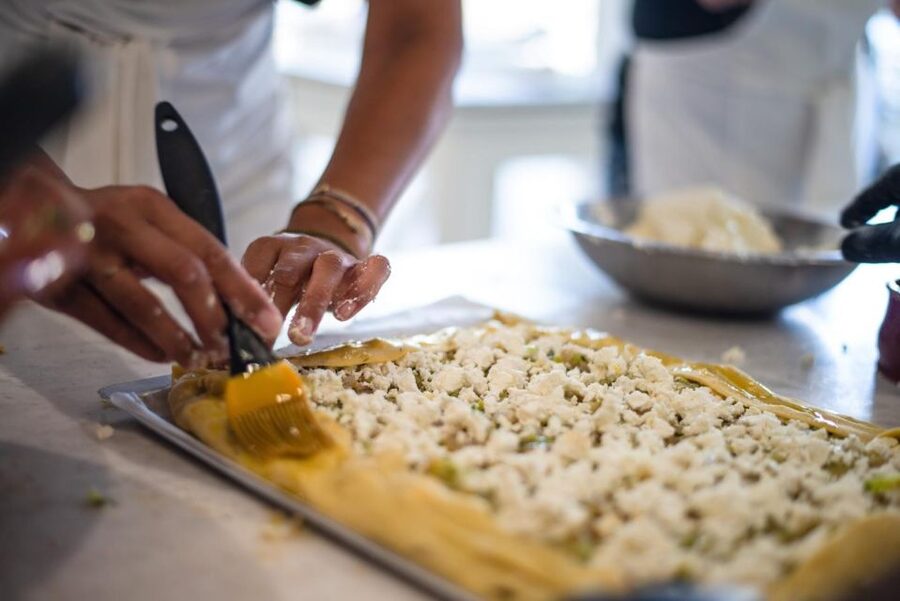 Greek Cooking Class with a Local Chef, Wine, & Meal in Drios - Sitting down to the meal you prepared