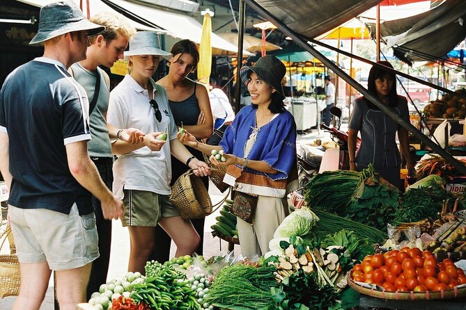 Half Day Guided Thai Cooking Class in Chiang Mai - Adjusting Chili, Ingredients, and Seasonings