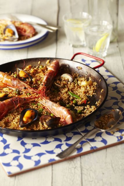 Half-Day Spanish Cooking Class & Boqueria Market Tour - Inside the kitchen: a shared Spanish meal