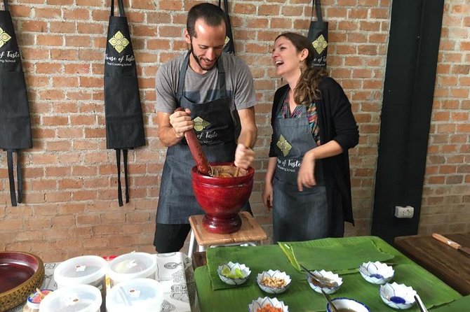 Hands on Thai Cooking Class and Market Tour - The morning route through Asok market